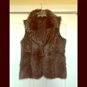 Dark brown fur reversible suede vest.